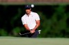 Tiger Woods hits a chip shot on the 11th hole during a practice round for the PGA Championship golf tournament at Southern Hills Country Club on Monday, May 16, 2022, in Tulsa, Okla. (Mike Simons/Tulsa World via AP)