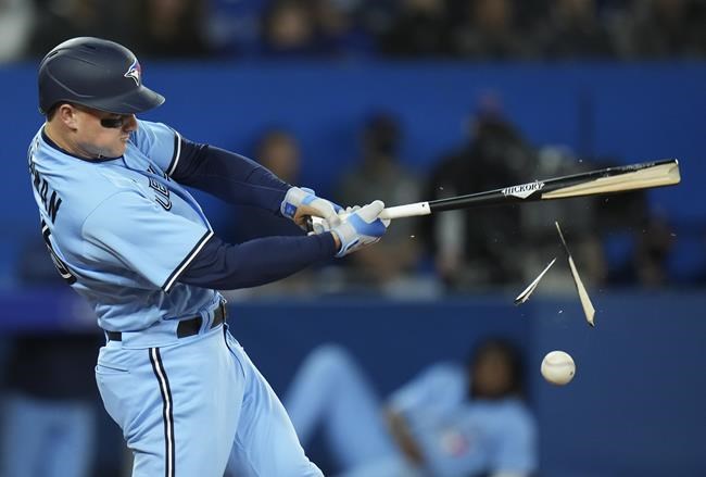 Toronto Blue Jays third baseman Matt Chapman (26) breaks his bat on a foul ball against the Seattle Mariners during sixth inning American League, MLB baseball action in Toronto on Monday, May 16, 2022. THE CANADIAN PRESS/Nathan Denette