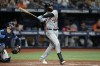 Detroit Tigers' Harold Castro (30) follows the flight of his solo home run off Tampa Bay Rays relief pitcher Andrew Kittredge during the ninth inning of a baseball game Monday, May 16, 2022, in St. Petersburg, Fla. (AP Photo/Chris O'Meara)