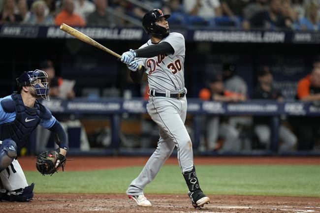 Detroit Tigers' Harold Castro (30) follows the flight of his solo home run off Tampa Bay Rays relief pitcher Andrew Kittredge during the ninth inning of a baseball game Monday, May 16, 2022, in St. Petersburg, Fla. (AP Photo/Chris O'Meara)