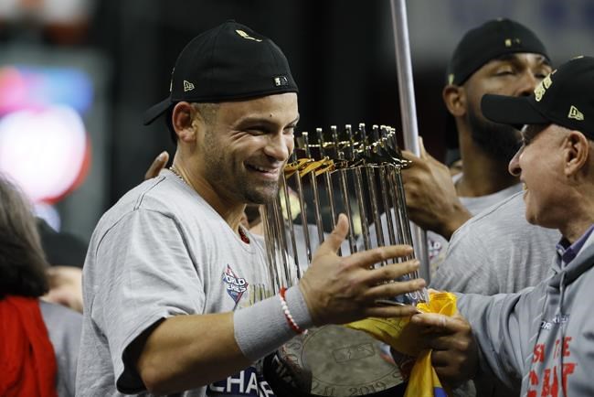FILE - Washington Nationals' Gerardo Parra celebrates after Game 7 of the baseball World Series against the Houston Astros Wednesday, Oct. 30, 2019, in Houston. The Nationals won 6-2 to win the series. On Monday, May 16, 2022, Parra announced on Instagram that he is retiring from baseball after 12 seasons in the major leagues and will become a special assistant to Washington Nationals general manager Mike Rizzo. (AP Photo/Matt Slocum, File)