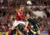 Nottingham Forest's Joe Worrall, left, and Sheffield United's Jack Robinson battle for a head ball during a Sky Bet Championship play-off semi-final, second leg soccer match against Nottingham Forest at the City Ground, Nottingham, England, Tuesday May 17, 2022. (Zac Goodwin/PA via AP)
