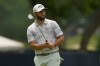 Jon Rahm, of Spain, putts on the seventh hole during a practice round for the PGA Championship golf tournament, Tuesday, May 17, 2022, in Tulsa, Okla. (AP Photo/Matt York)