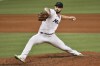 Miami Marlins relief pitcher Tanner Scott (66) delivers during the ninth inning of a baseball game against the Washington Nationals, Tuesday, May 17, 2022, in Miami. (AP Photo/Jim Rassol)