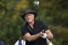 FILE - Greg Norman, of Australia, watches his tee shot on the first hole during the final round of the PNC Championship golf tournament on Dec. 20, 2020, in Orlando, Fla, USA. Norman's involvement in the Saudi Arabian-backed LIV golf tour and comments he's made about the killing of Washington Post columnist Jamal Khashoggi at a Saudi consulate in Turkey are being questioned by other Australian golfers. (AP Photo/Phelan M. Ebenhack, File)
