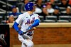 New York Mets' Brandon Nimmo watches his RBI triple during the eighth inning of the team's baseball game against the St. Louis Cardinals on Wednesday, May 18, 2022, in New York. (AP Photo/Frank Franklin II)