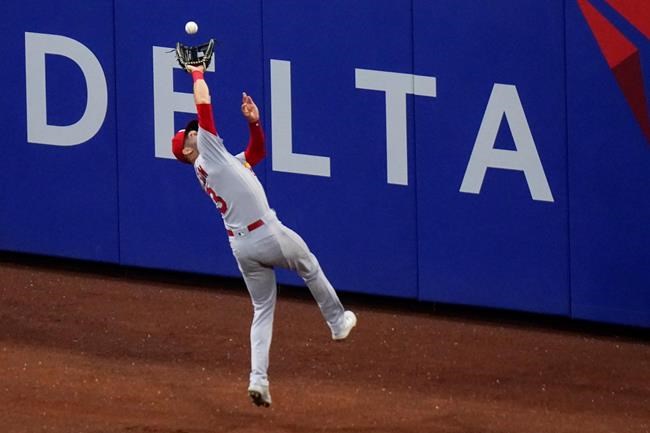 St. Louis Cardinals' Dylan Carlson catches a ball hit by New York Mets' Patrick Mazeika for the out during the second inning of a baseball game Wednesday, May 18, 2022, in New York. (AP Photo/Frank Franklin II)