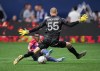 Vancouver Whitecaps goalkeeper Cody Cropper (55) stops FC Dallas' Jader Obrian during the first half of an MLS soccer game in Vancouver, on Wednesday, May 18, 2022. THE CANADIAN PRESS/Darryl Dyck