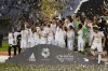 FILE - Real Madrid's payers celebrate after winning the Spanish Super Cup final soccer match between Real Madrid and Athletic Bilbao at King Fahd stadium in Riyadh, Saudi Arabia, Sunday, Jan. 16, 2022. Spanish state prosecutors have opened a probe into the contracts behind the Spanish Super Cup played in Saudi Arabia following leaked audios between the federation president and player Gerard Piqué regarding multi-million-euro commissions. (AP Photo/Hassan Ammar, File)