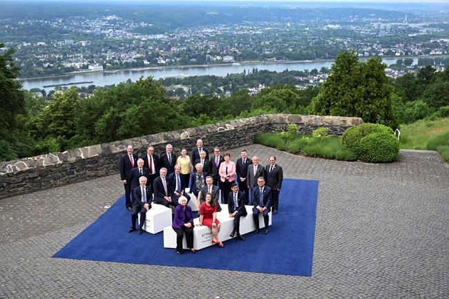 U.S. Treasury Secretary Janet Yellen, front, and participiants of a G7 Finance Ministers Meeting hosted by German Finance Minister Christian Lindner pose for a photo at the federal guest house Petersberg, near Bonn, Germany, Thursday, May 19, 2022. (Federico Gambarini/dpa via AP)