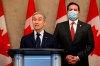 François-Philippe Champagne, Minister of Innovation, Science and Industry, and Marco Mendicino, Minister of Public Safety, hold a press conference to announce that Huawei Technologies and ZTE will be banned from Canada’s 5G networks, in the West Block of Parliament Hill in Ottawa, Ontario on Thursday, May 19, 2022. THE CANADIAN PRESS/David Kawai