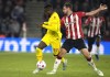 Southampton's Jack Stephens, right, challenges for the ball with Liverpool's Divock Origi during the English Premier League soccer match between Southampton and Liverpool at St. Mary's Stadium in Southampton, England, Tuesday, May 17, 2022. (AP Photo/Frank Augstein)