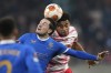 Leipzig's Tyler Adams, right, challenges Rangers' Scott Wright during the UEFA Europa League semifinal soccer match between RB Leipzig and Glasgow Rangers at the RB Arena in Leipzig in Leipzig, Germany, Thursday, April 28, 2022. (AP Photo/Matthias Schrader)