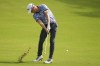 Justin Thomas hits from the fairway on the 18th hole during the second round of the PGA Championship golf tournament at Southern Hills Country Club, Friday, May 20, 2022, in Tulsa, Okla. (AP Photo/Matt York)