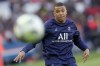 PSG's Kylian Mbappe warms up prior to the start of the French League One soccer match between Paris Saint Germain and Troyes at the Parc des Princes stadium in Paris, Sunday, May 8, 2022. (AP Photo/Christophe Ena)