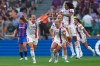 Olympique Lyon's Amandine Henry, left, celebrates after scoring her side's opening goal during the Women's Champions League final soccer match between Barcelona and Olympique Lyonnais at Allianz Stadium in Turin, Italy, Saturday, May 21, 2022. (Spada/LaPresse via AP)