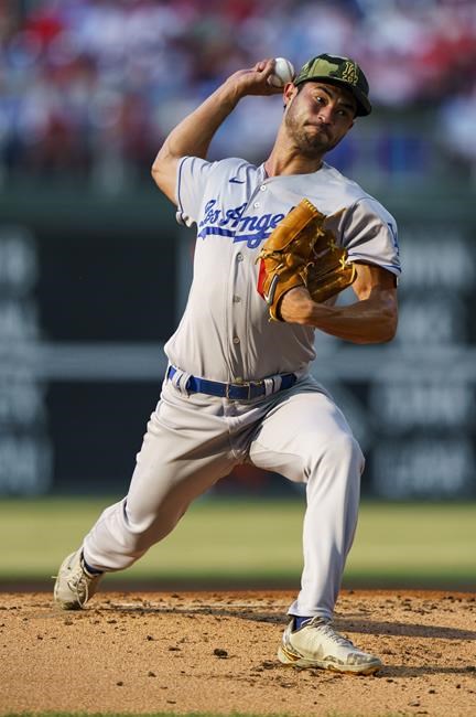 Los Angeles Dodgers starting pitcher Mitch White throws during the first inning of a baseball game against the Philadelphia Phillies, Saturday, May 21, 2022, in Philadelphia. (AP Photo/Chris Szagola)