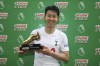 Tottenham Hotspurs' Son Heung-min with the Premier League Golden boot award after their English Premier League soccer match against Norwich City at Carrow Road, Norwich, London, Sunday, May 22, 2022. (Nigel French/PA via AP)