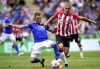 Leicester City's James Maddison, left, and Southampton's Oriol Romeu battle for the ball during their English Premier League soccer match at The King Power Stadium, Leicester, England, Sunday, May 22, 2022. (Mike Egerton/PA via AP)