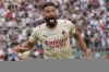 AC Milan's Olivier Giroud celebrates after he scored his side's second goal during the Serie A soccer match between Sassuolo and AC Milan at the Citta del Tricolore stadium, in Reggio Emilia, Italy, Sunday, May 22, 2022. (AP Photo/Antonio Calanni)