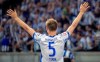 Berlin's Niklas Stark gestures to the Berlin fans after their defeat in the Bundesliga relegation play off soccer match between Hertha BSC and Hamburger SV at Olympiastadion in Berlin, Thursday May 19, 2022. (Andreas Gora/dpa via AP)