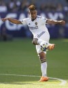 Los Angeles Galaxy midfielder Efrain Alvarez (26) shoots during the first half of an MLS soccer match against the Houston Dynamo in Carson, Sunday, May 22, 2022. (AP Photo/Ashley Landis)