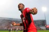 AC Milan goalkeeper Mike Maignan celebrates after winning a Serie A soccer match between AC Milan and Sassuolo, in Reggio Emilia's Mapei Stadium, Italy, Sunday, May 22, 2022. AC Milan secured its first Serie A title in 11 years on Sunday with a 3-0 win at Sassuolo. (Spada/LaPresse via AP)