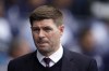 Aston Villa's head coach Steven Gerrard walks on the pitch before the start of the English Premier League soccer match between Manchester City and Aston Villa at the Etihad Stadium in Manchester, England, Sunday, May 22, 2022. (AP Photo/Dave Thompson)