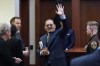 Actor Johnny Depp gestures to the gallery as he leaves for a break in the courtroom at the Fairfax County Circuit Courthouse in Fairfax, Va., Monday, May 23, 2022. Depp sued his ex-wife Amber Heard for libel in Fairfax County Circuit Court after she wrote an op-ed piece in The Washington Post in 2018 referring to herself as a 