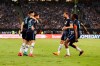 Hertha players celebrate after avoiding relegation from the Bundesliga, after the German Bundesliga relegation/promotion playoff soccer match between Hamburger SV and Hertha Berlin at the Volksparkstadion in Hamburg, Germany, Monday, May 23, 2022. Hertha Berlin has taken its final chance to clinch Bundesliga survival with a 2-0 win at Hamburger SV in the second leg of their relegation/promotion playoff. (Gregor Fischer/dpa via AP)