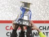 CF Montreal players hoist the Voyageurs Cup after beating  Toronto FC in the Canadian Championship soccer final in Montreal, Sunday, Nov. 21, 2021.&nbsp;CF Montreal will have to put their recent dip in form behind them as the defence of their Canadian Championship title begins Wednesday against Canadian Premier League side Forge FC at Stade Saputo. THE CANADIAN PRESS/Graham Hughes