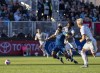Toronto FC Ralph Priso grabs HFX Wanderers Andre Rampersad during first half Canadian Championship soccer quarterfinal action at Wanderers Ground in Halifax on Tuesday, May 24, 2022. THE CANADIAN PRESS/Andrew Vaughan
