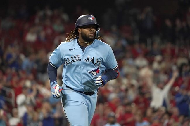 Toronto Blue Jays' Vladimir Guerrero Jr. rounds the bases after hitting a solo home run during the sixth inning of a baseball game against the St. Louis Cardinals Tuesday, May 24, 2022, in St. Louis. (AP Photo/Jeff Roberson)