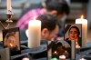 Photos of some of the victims stand among candles as members of Toronto's Iranian community attend a vigil in Toronto on Wednesday, January 8, 2020, to mourn victims of Ukraine International Airlines Flight PS752 that crashed after takeoff near Tehran, Iran.&nbsp;Canada Soccer has cancelled a planned friendly with Iran in the face of growing criticism.&nbsp;At issue is whether Canada should be hosting Iran given the Canadians who died on Ukraine International Airlines Flight 752 when it was shot down on Jan. 8, 2020, minutes after taking off from Tehran, by an Iranian surface-to-air missile. THE CANADIAN PRESS/Chris Young