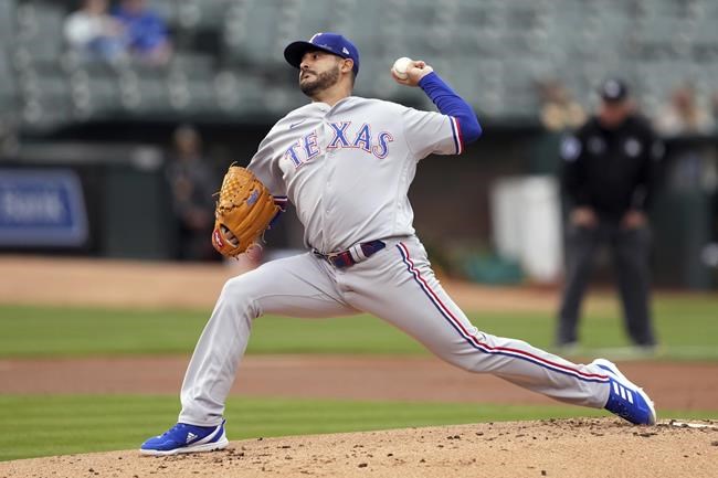 Texas Rangers starting pitcher Martin Perez throws to an Oakland Athletics batter during the first inning of a baseball game Thursday, May 26, 2022, in Oakland, Calif. (AP Photo/Darren Yamashita)