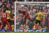 Wolverhampton Wanderers' goalkeeper John Ruddy makes a save ahead the Liverpool's Sadio Mane during the Premier League soccer match between Liverpool and Wolverhampton at Anfield stadium in Liverpool, England, Sunday, May 22, 2022. (AP Photo/Jon Super)