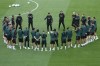 Liverpool's manager Jurgen Klopp, center, talks with his team during a training session at the Stade de France in Saint Denis near Paris, Friday, May 27, 2022. Liverpool and Real Madrid are making their final preparations before facing each other in the Champions League final soccer match on Saturday. (AP Photo/Kirsty Wigglesworth)