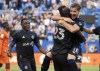 CF Montreal Matko Miljevic, right, celebrates with teammate Kei Kamara following a goal by forward Sunusi Ibrahim, left, as they face the Forge FC during first half Canadian Championship quarterfinal action in Montreal on Wednesday, May 25, 2022. THE CANADIAN PRESS/Paul Chiasson