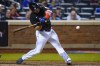 New York Mets' Pete Alonso hits an RBI double against the Philadelphia Phillies during the fourth inning of a baseball game Friday, May 27, 2022, in New York. (AP Photo/Frank Franklin II)