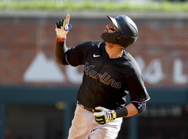 Marlins' Miguel Rojas runs the bases after his sixth-inning home run against the Atlanta Braves in a baseball game Saturday, May 28, 2022, in Atlanta. (AP Photo/Bob Andres)