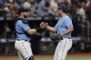 Tampa Bay Rays catcher Mike Zunino, left, celebrates with relief pitcher J.P. Feyereisen after a baseball game against the New York Yankees, Sunday, May 29, 2022, in St. Petersburg, Fla. (AP Photo/Scott Audette)