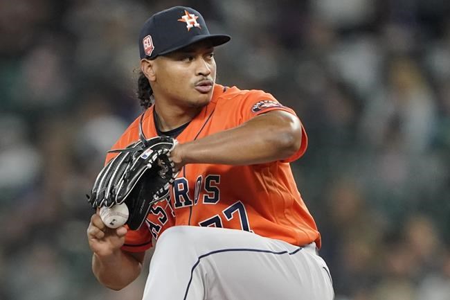 Houston Astros starting pitcher Luis Garcia throws against the Seattle Mariners during the fifth inning of a baseball game, Sunday, May 29, 2022, in Seattle. (AP Photo/Ted S. Warren)