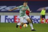 FILE - Celtic's Tom Rogic in action during the Europa League Group H soccer match between Lille and Celtic Glasgow at the Stade Pierre Mauroy stadium in Villeneuve d'Ascq, northern France on Oct. 29, 2020. Football Australia announced Tuesday, May 31, 2022 that Rogic had been unable to join the squad in Doha, Qatar, to prepare for the June 7 Asian playoff against United Arab Emirates. (AP Photo/Michel Spingler, FIle)