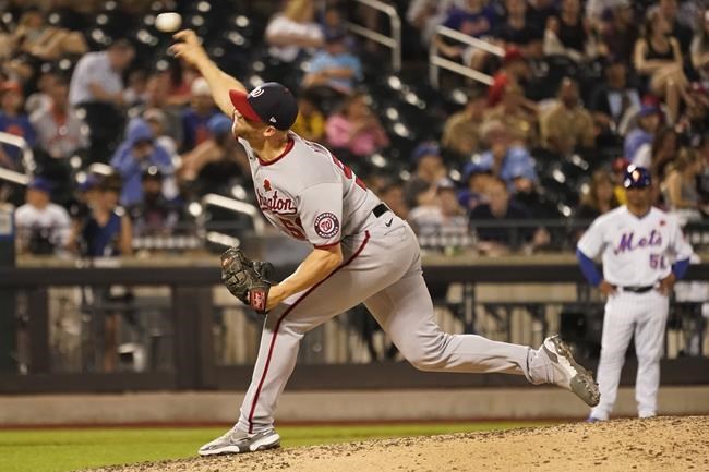 Washington Nationals starting Austin Voth during delivers against the New York Mets the fourth inning of a baseball game, Monday, May 30, 2022, in New York. (AP Photo/Mary Altaffer)
