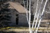 Tyler Clarke/The Brandon Sun
Police tape surrounds a house in Ninette on Saturday — the scene of a suspected homicide.
