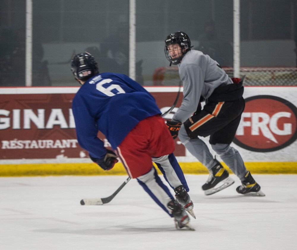 Ashton Cumby (right) was chosen by the Ice in the fourth round of the 2020 WHL Draft. (Jessica Lee / Winnipeg Free Press)
Ashton Cumby (3) skates after the puck at an ICE training camp on September 2, 2021
Reporter: Mike S.