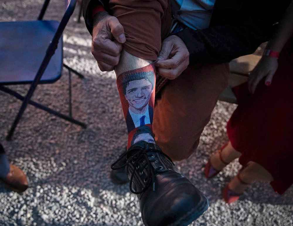 JESSICA LEE/WINNIPEG FREE PRESS
A man shows off one of his socks bearing Trudeau's likeness. (Jessica Lee / Winnipeg Free Press)