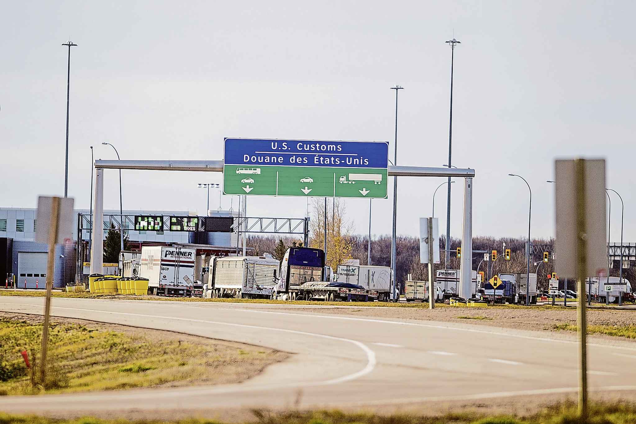 Business booming at border booze stop after U.S. opens doors locked by