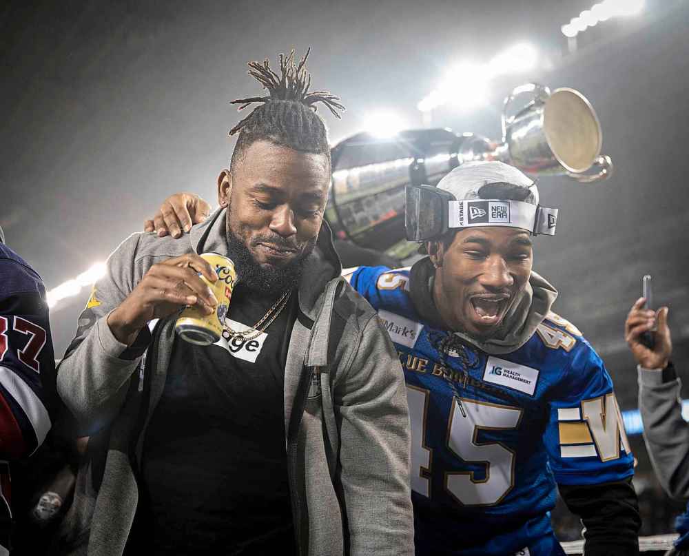 JESSICA LEE / WINNIPEG FREE PRESS
Blue Bombers Nick Taylor (left) and DeAundre Alford cut loose with their fans Wednesday.