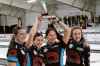 Brandon Sun Lead Lauren Lenentine, left, second Emily Zacharias, third Karlee Burgess and skip Mackenzie Zacharias hoist up the Manitoba Scotties Tournament of Hearts trophy after a 7-5 victory over Kristy Watling in Sunday's final at the Carberry Plains Community Centre. (Lucas Punkari/The Brandon Sun)